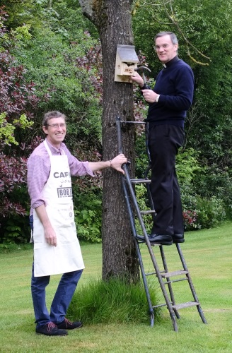 Bishop_John_Arnold_fixing_his_BOB_Box